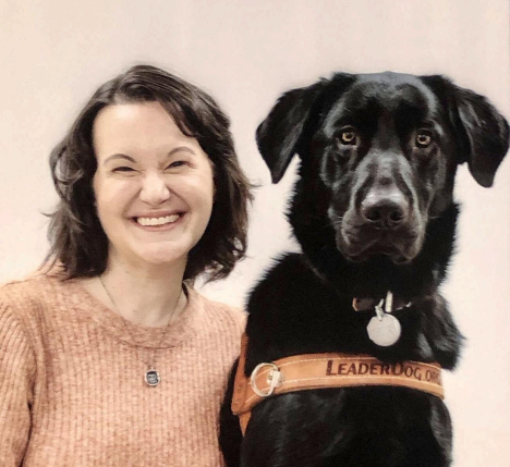 Erica Rodman with her seeing eye dog